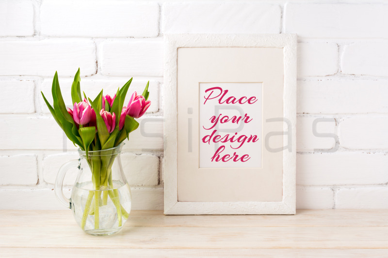 white-frame-mockup-with-magenta-pink-tulips-bouquet