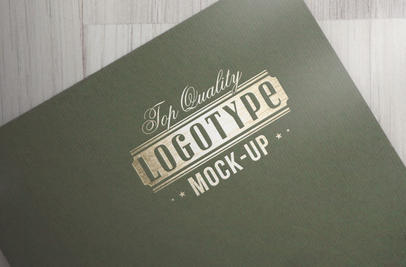 exclusive-logotype-mock-up-gold-craft-on-riffled-paper