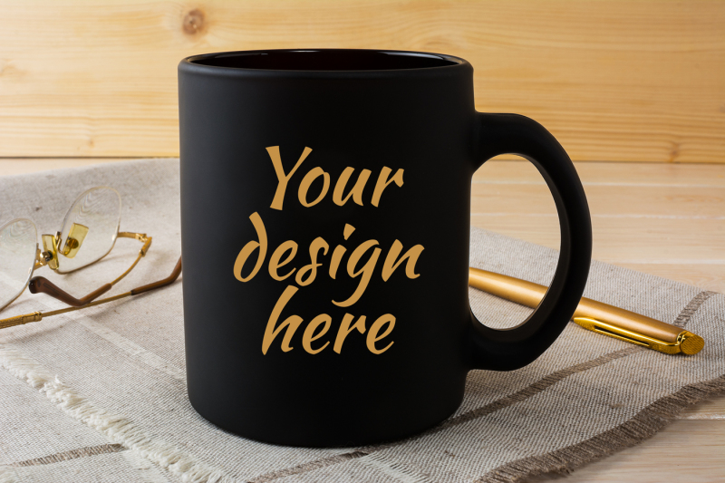 Download Black coffee mug mockup with glasses and pen PSD