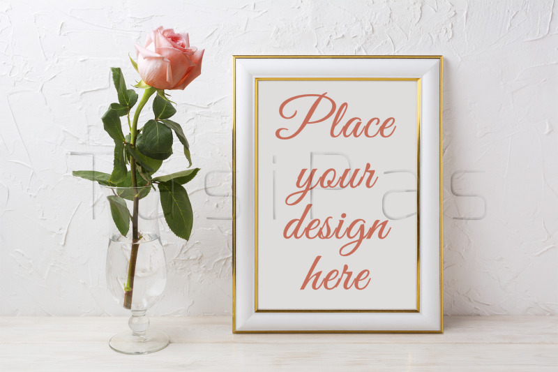 gold-decorated-frame-mockup-with-rose-in-exquisite-glass-vase