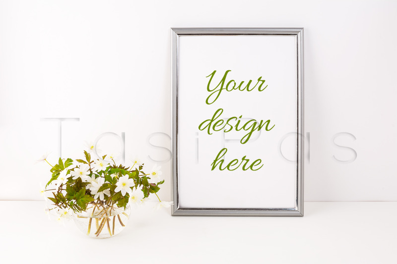 silver-frame-mockup-with-rue-anemone-flowers