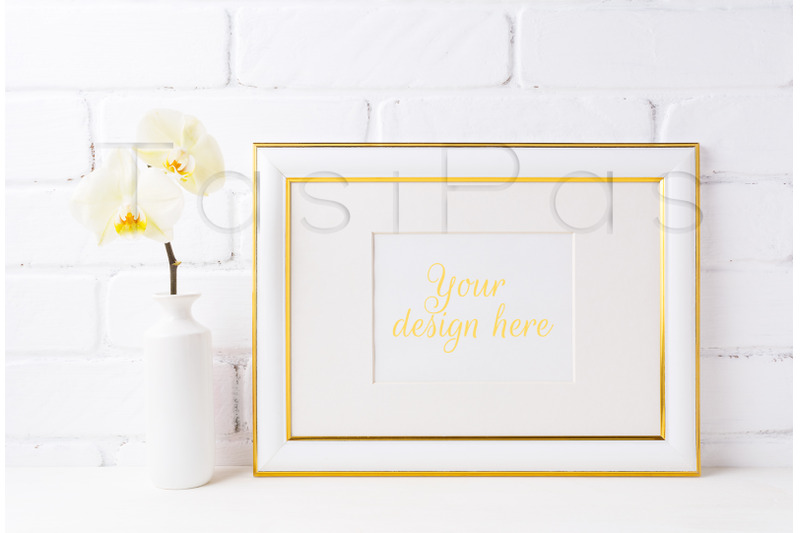 gold-decorated-landscape-frame-mockup-with-soft-yellow-orchid-in-vase