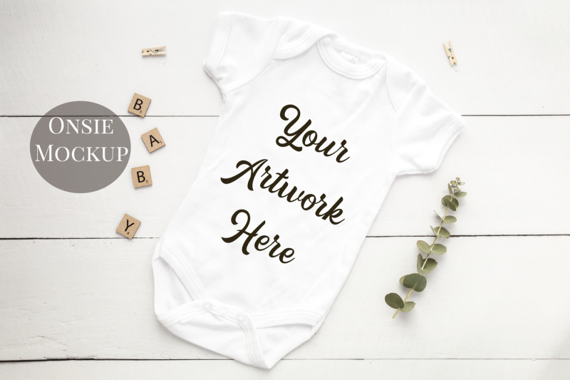 Download Free Babygrow, romper suit, onsie mockup with white wooden ...