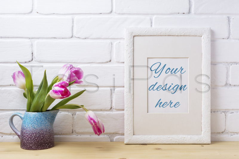 white-frame-mockup-with-pink-tulip-in-blue-pitcher