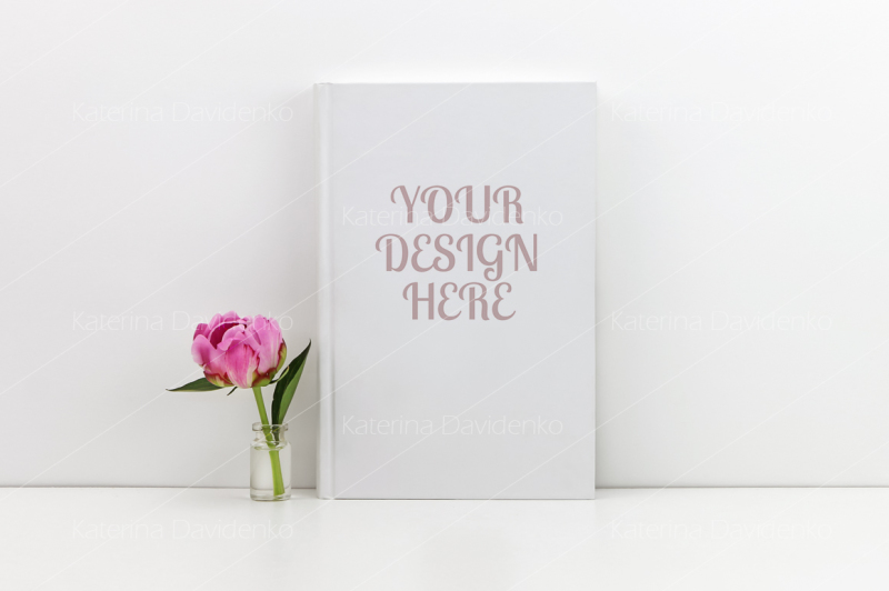white-book-mockup-with-a-pink-peony-flower