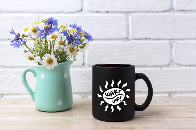 Download Download Black coffee mug mockup with cornflower and daisy in pitcher PSD Mockup - Advertising ...