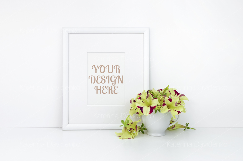 vertical-frame-mockup-flowers-on-cup-white-background