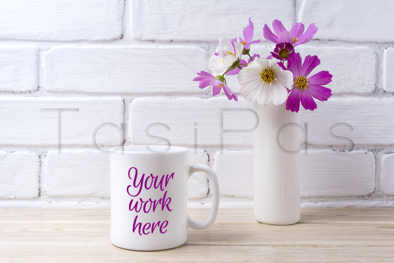 white-coffee-mug-mockup-with-white-and-pink-daisy