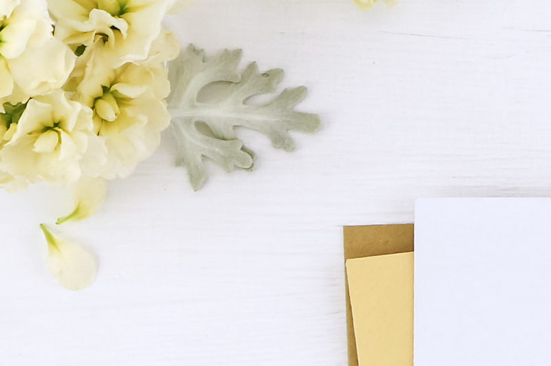 postcard-mockup-whith-flowers-and-envelope-on-white-background