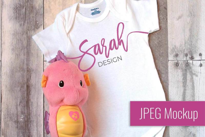 Free JPEG Flatlay Mockup | Gerber White Unisex Body Suit for Baby (PSD Mockups)