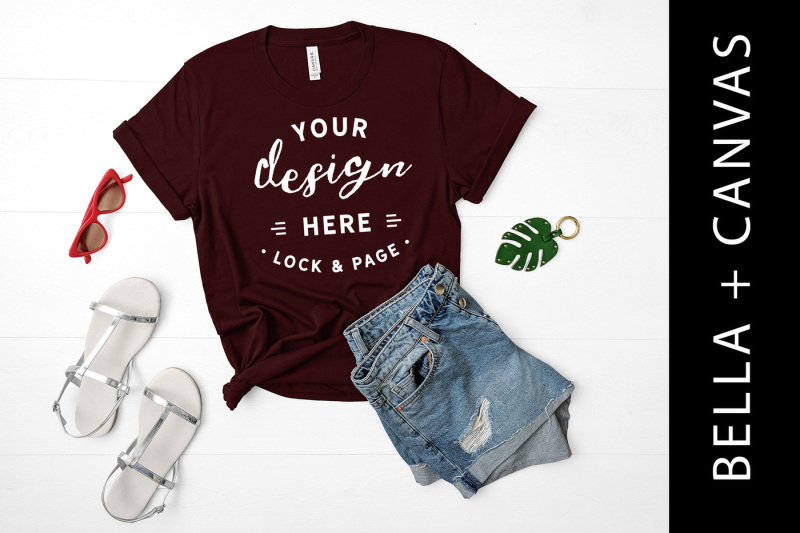Free Oxblood Black Bella Canvas 3001 T-Shirt Mockup Beach Wood Backdrop (PSD Mockups)