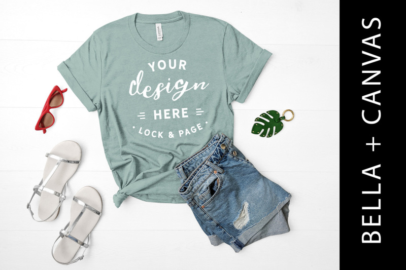 Free Heather Dusty Blue Bella Canvas 3001 T Shirt Mockup Ladies Flat Lay (PSD Mockups)