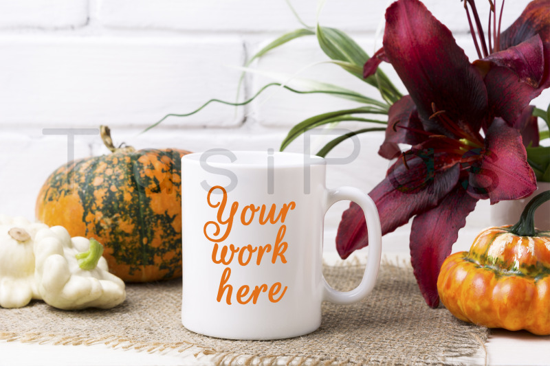 white-coffee-mug-mockup-with-pumpkin-and-red-lily
