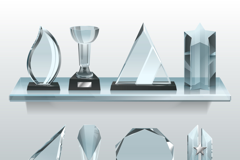 collections-of-transparent-trophies-awards-and-winner-cups-on-shelf-o