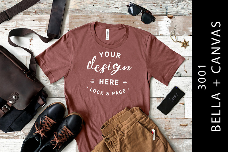 Free Men's Mauve Bella Canvas 3001 T-Shirt Mockup On Wood Floor (PSD Mockups)