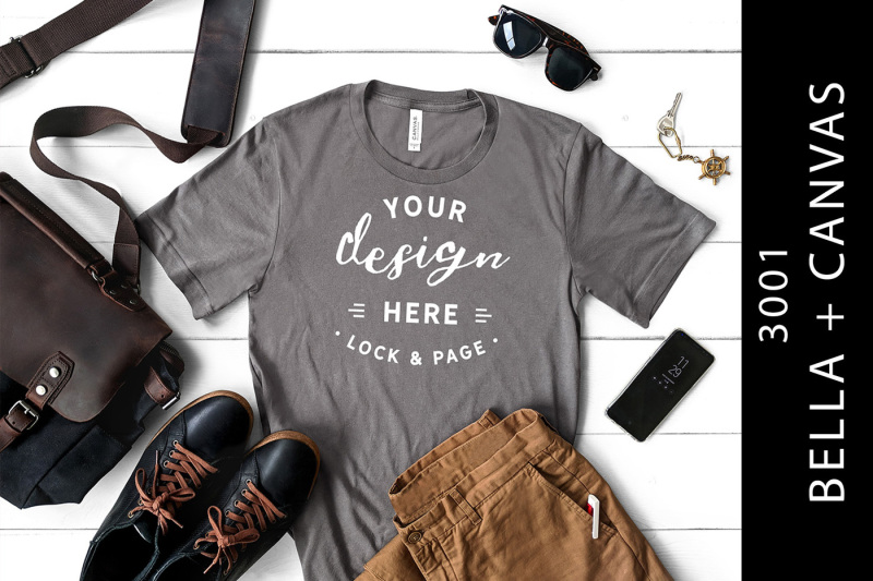 Free Male Storm Bella Canvas 3001 T-Shirt Mockup Fashion Flat Lay (PSD Mockups)