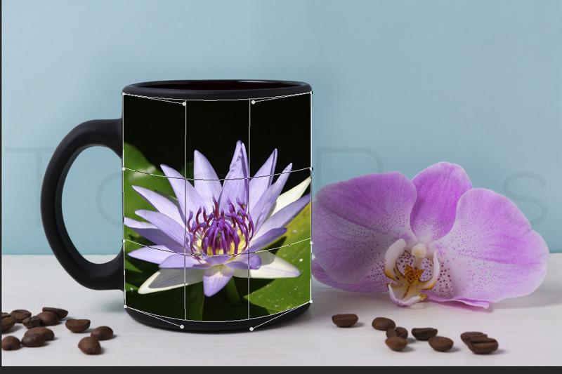 black-mug-mockup-with-orchid-and-coffee-beans