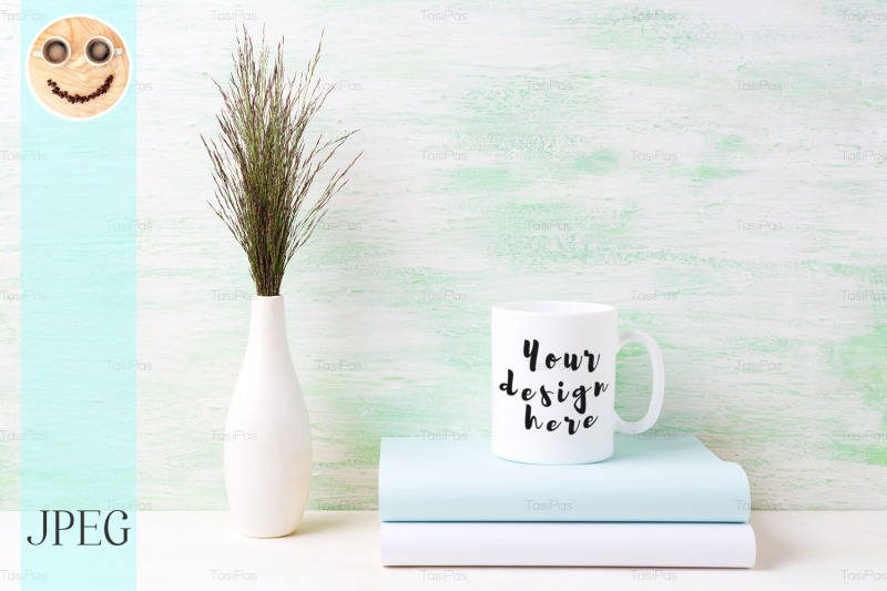 white-coffee-mug-mockup-with-dark-meadow-grass-in-vase-and-books