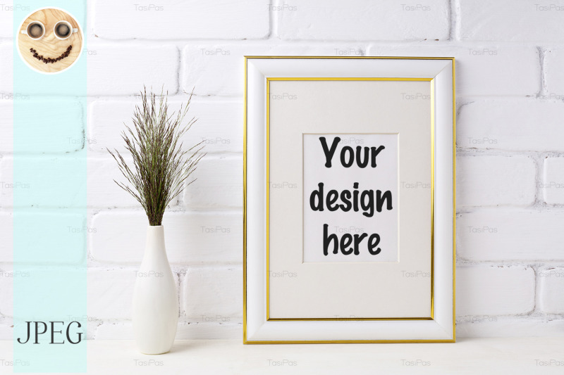 gold-decorated-frame-mockup-with-dark-grass-in-vase-near-brick-wall