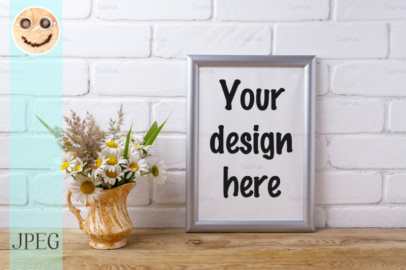 silver-frame-mockup-with-chamomile-and-grass-in-golden-pitcher
