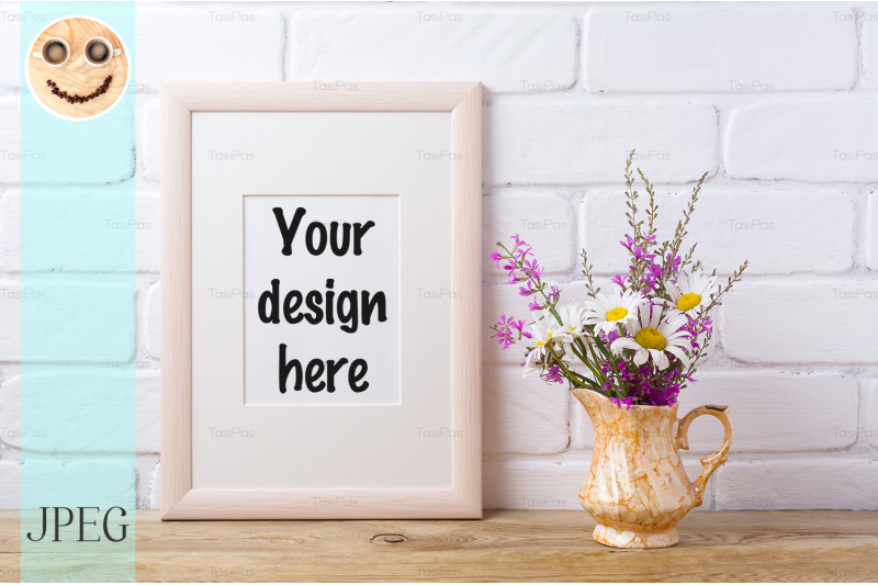 wooden-frame-mockup-with-chamomile-and-purple-flowers-in-golden-pitche