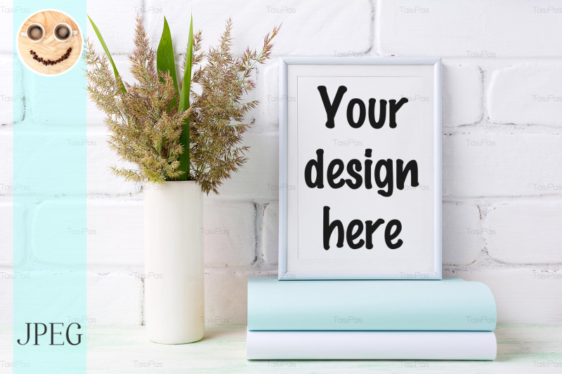 white-frame-mockup-with-grass-and-green-leaves-in-cylinder-vase