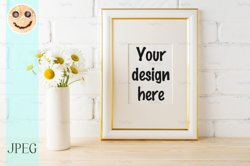 gold-decorated-frame-mockup-with-daisy-near-painted-brick-wall