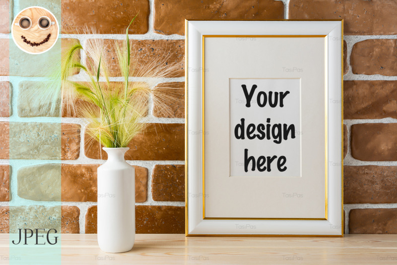 gold-decorated-frame-mockup-with-ornamental-grass-exposed-brick-wall