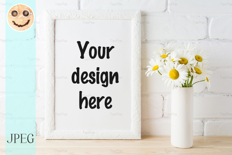 white-frame-mockup-with-daisy-flower-near-painted-brick-wall