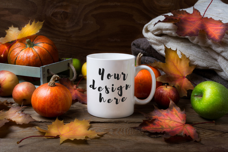 white-coffee-mug-mockup-with-fall-leaves-pumpkins