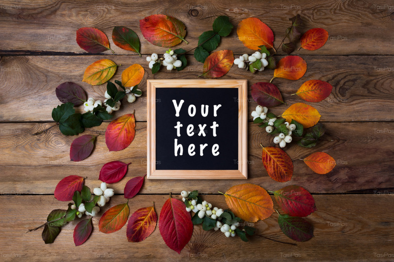wooden-square-picture-frame-mockup-with-fall-leaves
