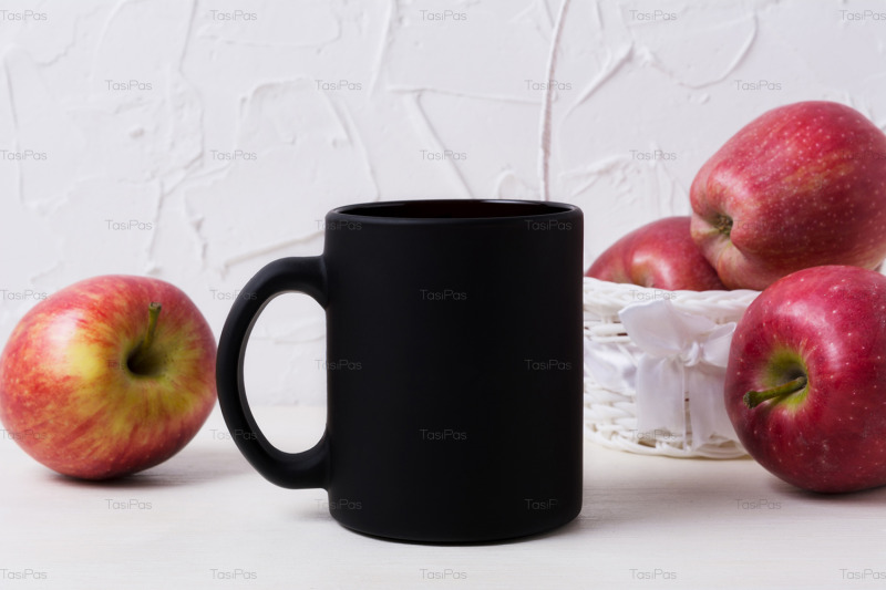 black-coffee-mug-mockup-with-apples-in-white-basket