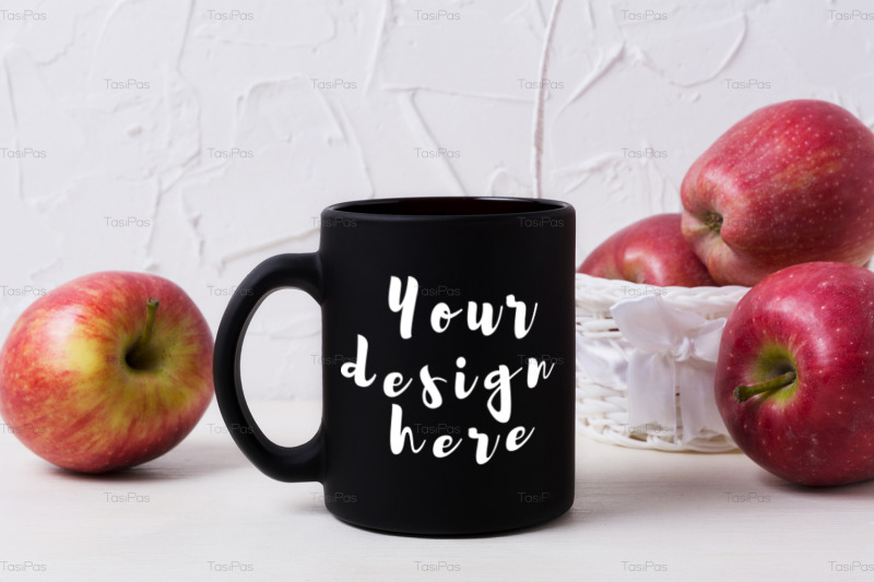 black-coffee-mug-mockup-with-apples-in-white-basket