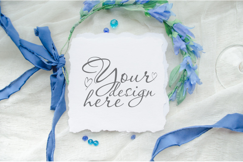 square-wedding-mock-up-with-blue-silk-ribbons-and-flowers