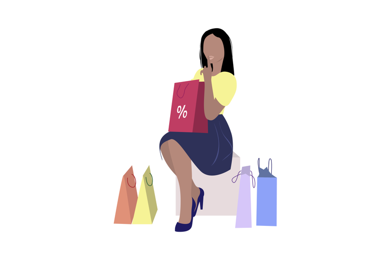 woman-in-boutique-with-purchase-shopper-and-packs