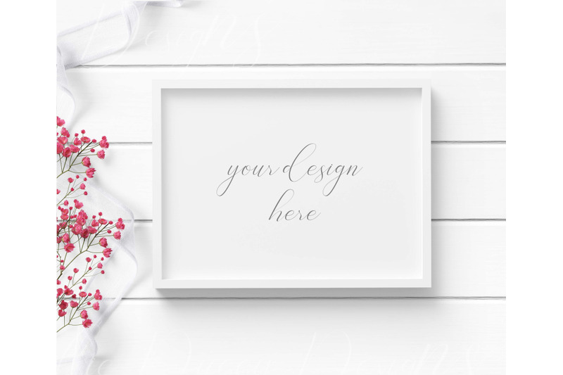 5x7-white-frame-mockup-with-white-ribbon-amp-red-flowers-on-white-wood