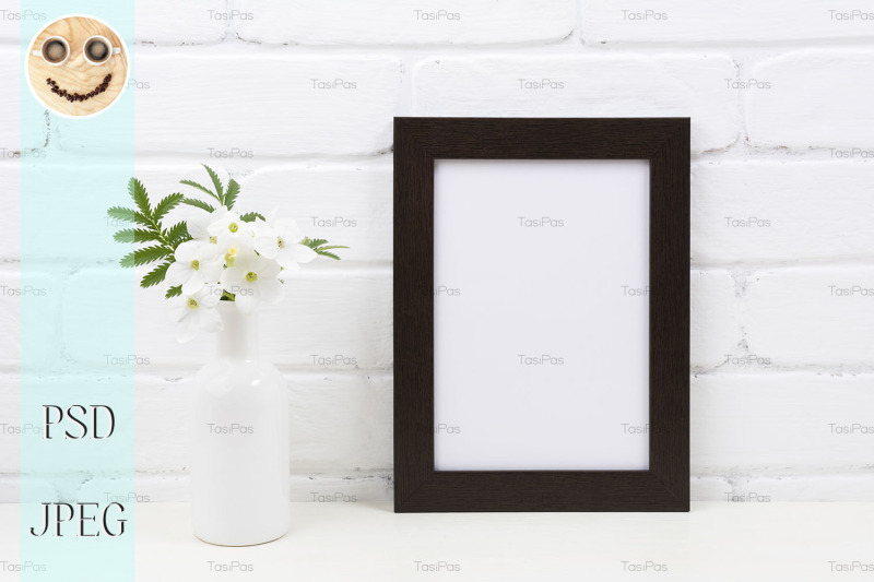 black-brown-poster-frame-mockup-with-tobacco-flowers