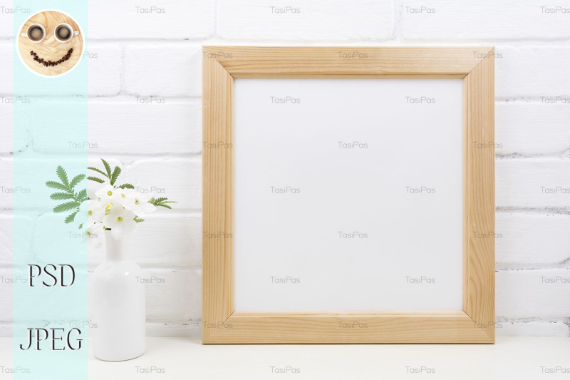 wooden-square-frame-mockup-with-tobacco-flowers
