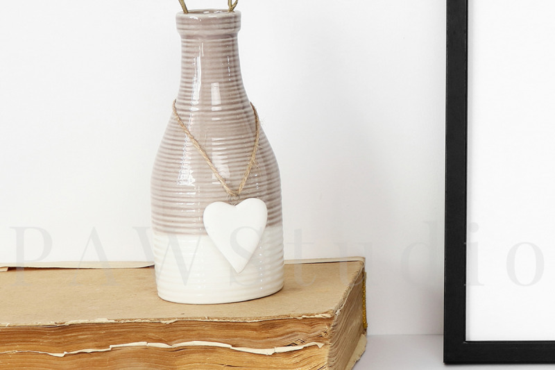 black-frame-mockup-with-beige-vase