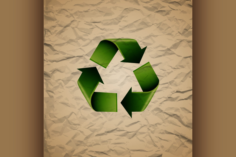 green-recycle-symbol-on-crumpled-cardboard