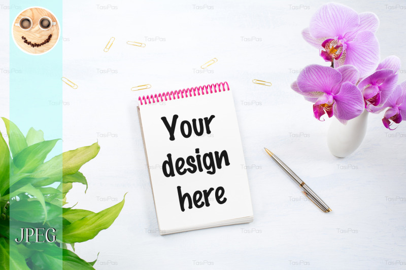 notepad-mockup-with-green-plant-and-pink-orchid