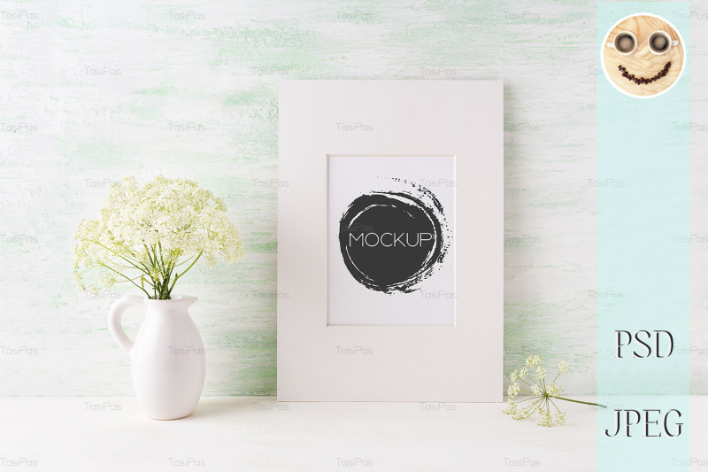 easy-white-frame-mockup-with-tender-wild-flowers-in-pitcher