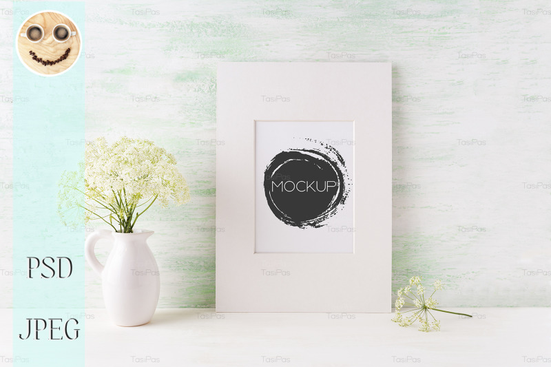 easy-white-frame-mockup-with-tender-wild-flowers-in-pitcher