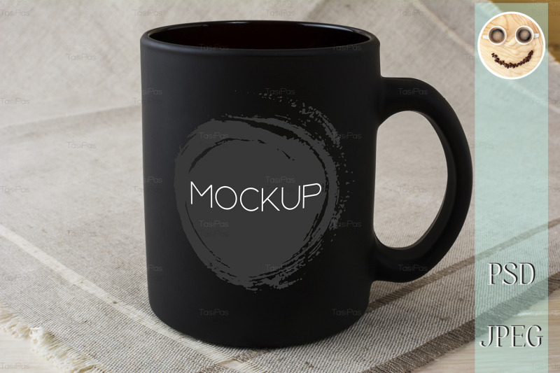 black-coffee-mug-mockup-on-the-linen-napkin