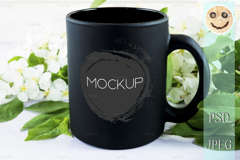 black-coffee-mug-mockup-with-apple-blossom