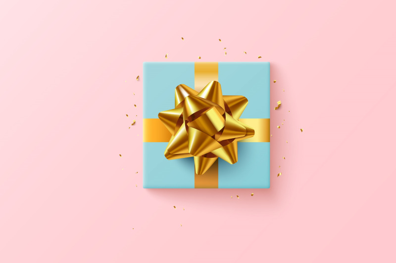 blue-gift-box-with-golden-ribbon-top-view-on-pinck-background