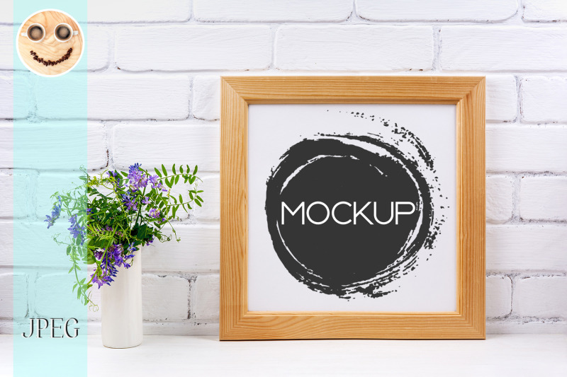 square-wooden-picture-frame-mockup-with-bird-vetch