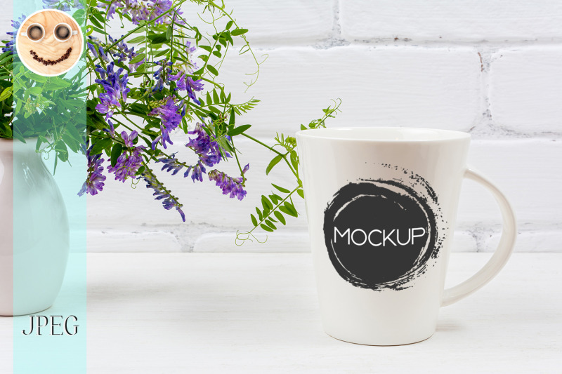 white-coffee-latte-mug-mockup-with-purple-bird-vetch