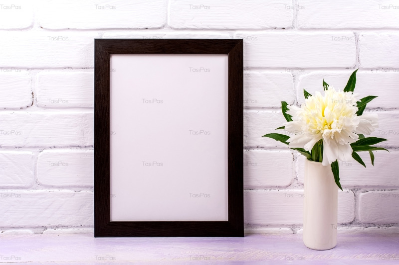 black-brown-poster-frame-mockup-with-white-peony
