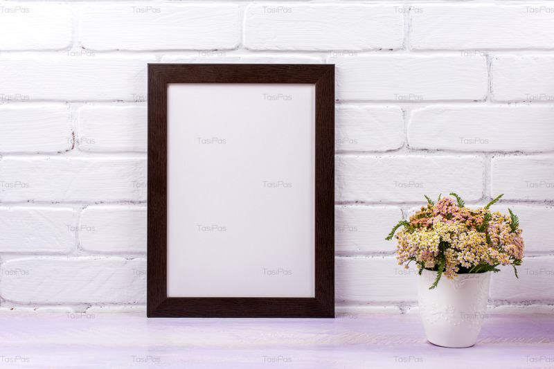 black-brown-poster-frame-mockup-with-pink-yarrow